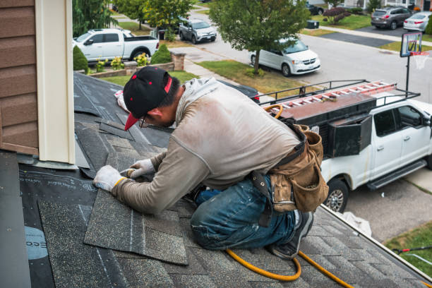 Professional Roof Replacement technician working in Hunt, NY
